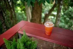 Iced tea, healthy drink in the natural area, beverage concept photo
