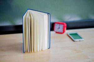 Hands and books that are laid bare with space In the morning room Book reading concept photo