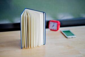 Hands and books that are laid bare with space In the morning room Book reading concept photo