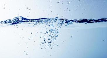 Water and bubbles on the blue water background photo