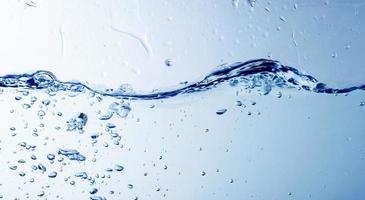 Water and bubbles on the blue water background photo