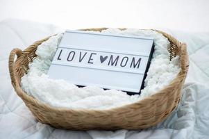 White mother's love sign instead of love for mother photo