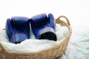 The boxing gloves of the boxers are placed in whites with hope and determination for boxing. photo