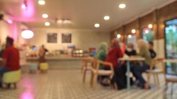 blur people at buffet catering room photo