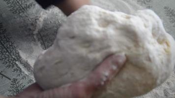 Woman sculpting bread cakes from flour video