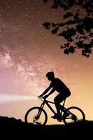 mountain bikers in the evening photo