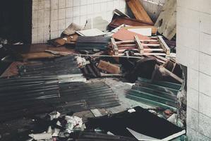 Houses and fields in ruins, demolished, abandoned and junkyard photo