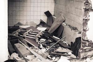 Houses and fields in ruins, demolished, abandoned and junkyard photo