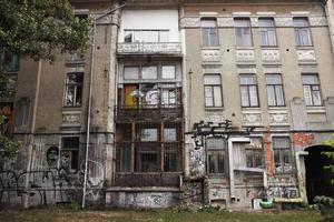 Abandoned ruined buildings with graffiti walls in Kyiv photo