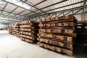 The group of wooden pallet in the factory. Pallet is a busy noun, but it's mainly a slab or framework of wood used for carrying things. The most common type of pallet is the kind used to move cargo.