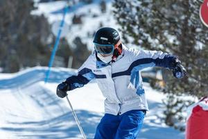 Grandvalira, Andorra . 2022 March 15 .  People skiing on the slopes of the Grandvalira Ski Resort in Andorra in 2022. photo
