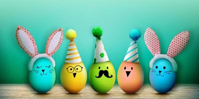 Easter background with colorful easter eggs on wooden background. photo