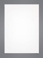 White paper sheet isolated on gray background. photo