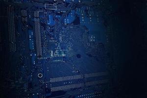 Blue electronic circuit board technology background photo