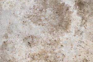 Cracked and abstract grunge texture. Aged material surface backdrop. Weathered effect pattern. Old and dirty background. photo