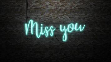 The message Miss you  neon light on Brick wall bcakground photo