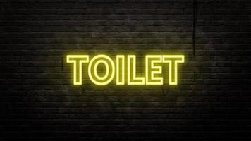 toilet sign emblem in neon style on brick wall background photo