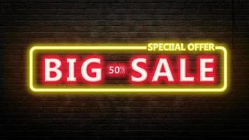 BIG SALE sign emblem in neon style on brick wall background photo