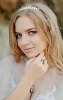 Portrait of a bride in the mountains. photo