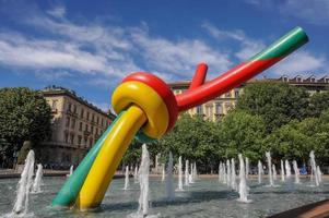Milan Italy 2014 Sculpture that represents needle and thread in homage to fashion in Milan's piazza Cadorna photo
