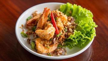 Stir fried crispy shrimp with chilies, salt and garlic. photo