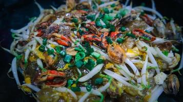 Pan-fried mussel pancake or mussel omellette with bean sprout in egg batter. photo