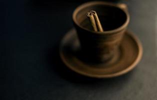 cinnamon stick in a mug photo
