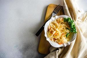 Healthy salad with fermented cabbage photo