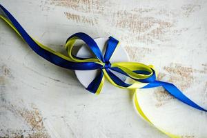 Blue and yellow ribbons in Ukrainian flag colors photo