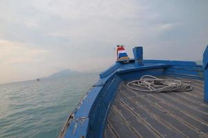 wooden boat on ocean photo