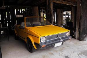 classic car is yellow color photo