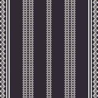 Monochrome embroidery seamless background. Small ethnic tribal shape vertical simple pattern design. Use for fabric, textile, interior decoration elements, upholstery, wrapping.