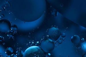abstract liquid circles background. 3D bubble texture. trendy fluid gradient for design, template, and copy space photo