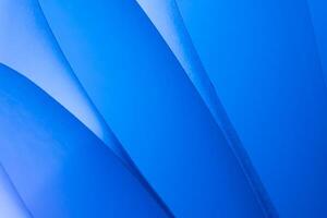 colorful abstract wallpaper texture. background macro of origami pattern made of curved sheets of paper. photo