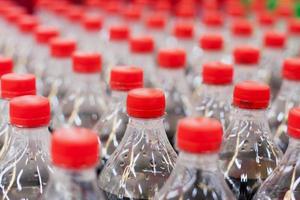 Bottles with soft drinks photo