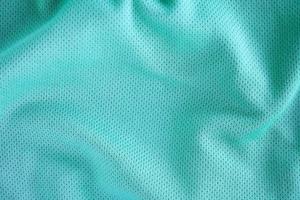 Sport clothing fabric texture background, top view of cloth textile surface photo