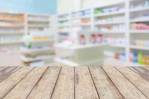pharmacy store drugs shelves interior blurred background