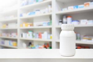 medicine bottle on counter in the pharmacy photo