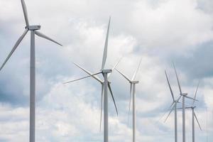 Wind turbines with the clouds and sky photo