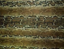 la textura de la serpiente de rayas de tela impresa para el fondo foto