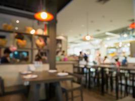 cafetería borrosa, cafetería restaurante con fondo de luz bokeh abstracto foto