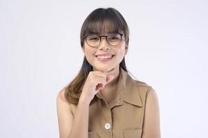 Beautiful woman wearing glasses over white background studio photo