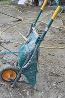 Wheelbarrow hand propelled vehicle in a building site photo