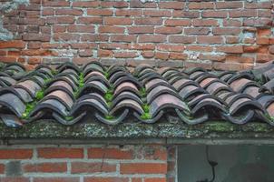 Detail of red roof tiles photo