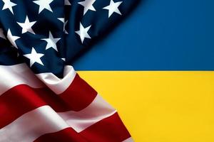 American flag and National flag of Ukraine background photo