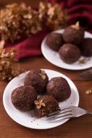 Homemade raw vegan chocolate balls photo