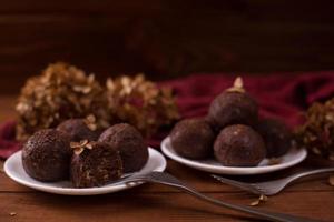 Homemade raw vegan chocolate balls photo