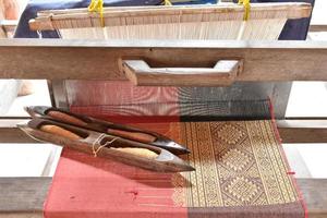 Small weaving looms made from wood used for weaving in rural Thai households. photo