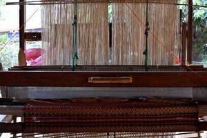 Small weaving looms made from wood used for weaving in rural Thai households. photo