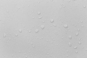 el concepto de gotas de lluvia que caen sobre un fondo gris superficie blanca húmeda abstracta con burbujas en la superficie gotas de agua de gotas de agua pura realistas para el diseño creativo de pancartas
